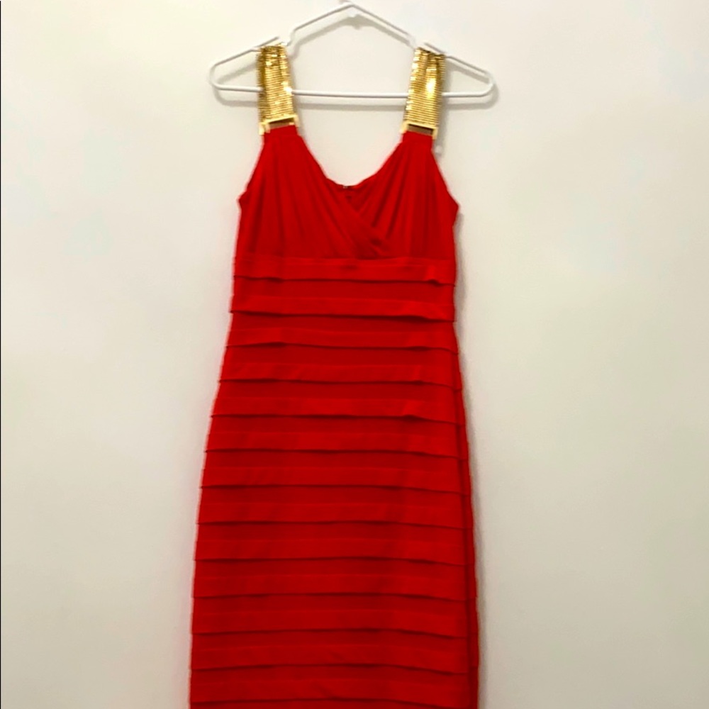 Orange Dress with metallic gold accessories